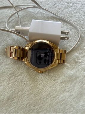 Michael Kors Gold Tone Smartwatch with Metal Bracelet